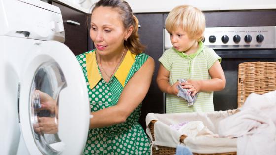 woman loading dishwasher
