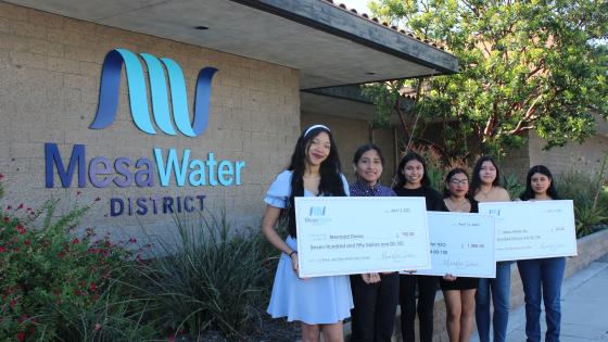 Mesa water building with girls in front