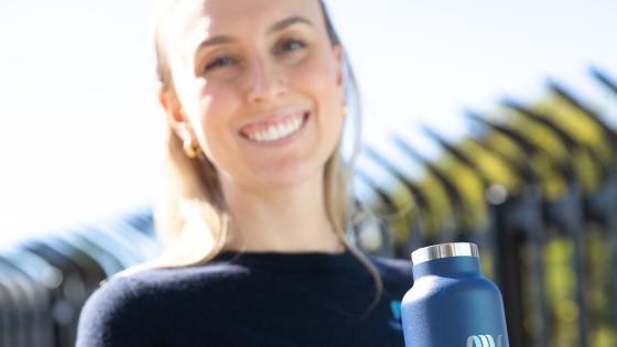 girl holding water bottle