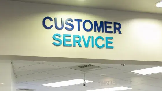 photo of sign that says customer service.